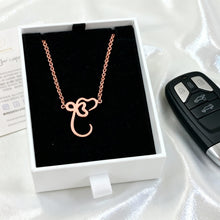 Load image into Gallery viewer, Rose gold necklace in a box with an Audi key fob on a white background