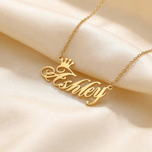 Load image into Gallery viewer, Gold necklace with 'Ashley' pendant on a beige fabric background